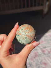 Load image into Gallery viewer, Old stock ocean jasper sphere
