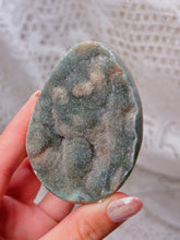 Load image into Gallery viewer, Green druzy rainbow amethyst egg on stand
