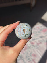 Load image into Gallery viewer, Cosmic/sea jasper sphere
