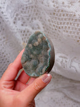 Load image into Gallery viewer, Green druzy rainbow amethyst egg on stand
